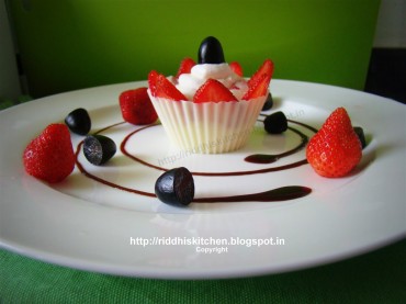 Strawberry yogurt in chocolate cup