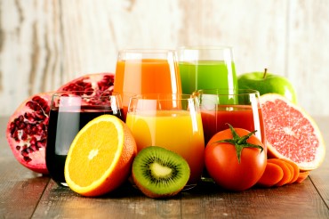 Glasses with fresh organic vegetable and fruit juices Detox diet.